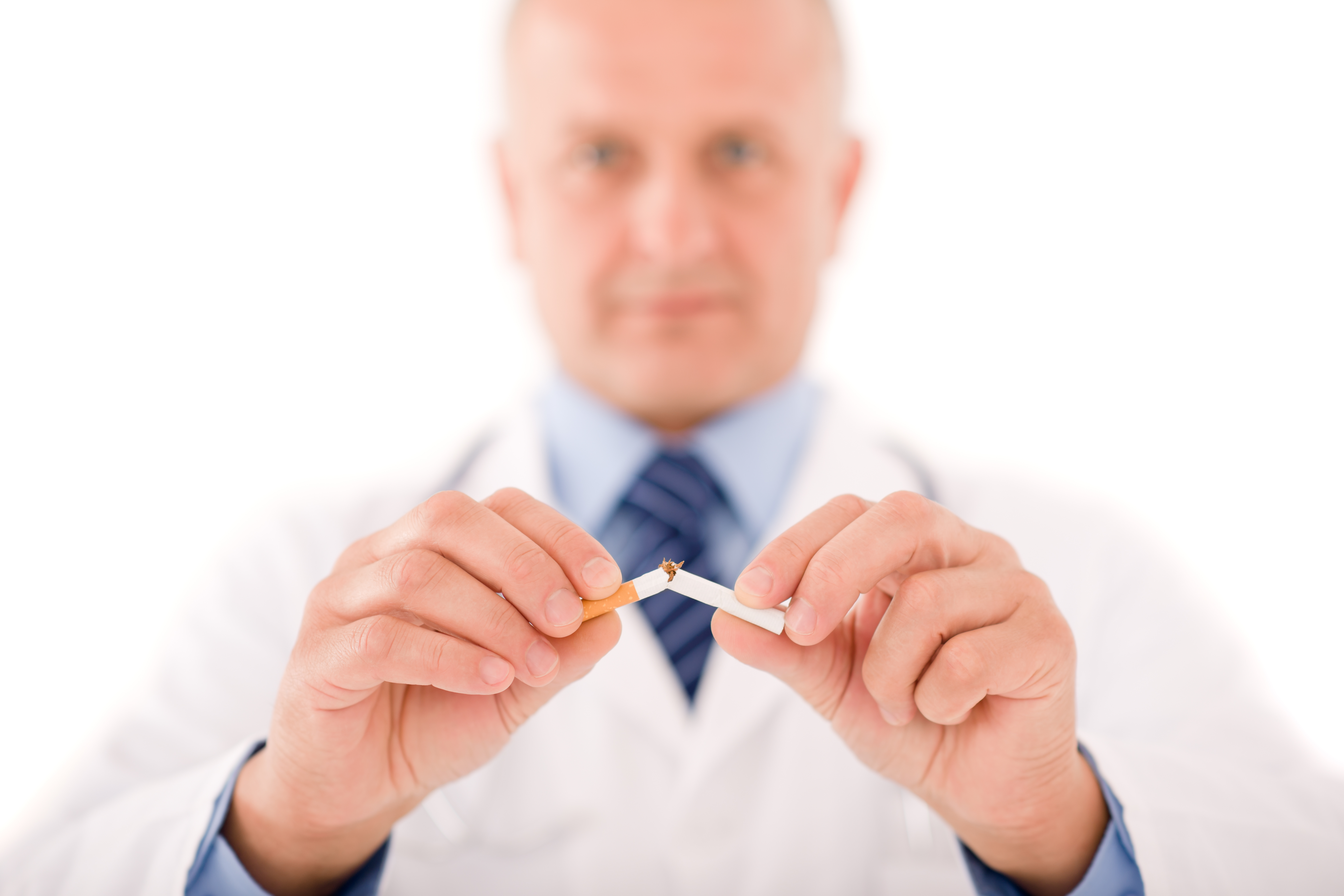 doctor breaks cigarette focusing on hand SBI 300904253 v2